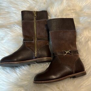 Adorable pair of boots.  Brass horse bit detail.